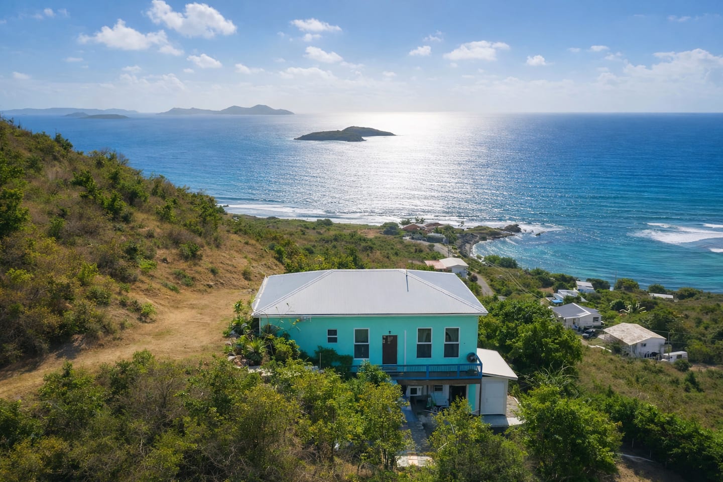 Aerial view of Surf Sound Cottage and the Caribbean coastline